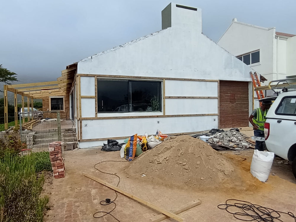 Cladding With Roof Sheets