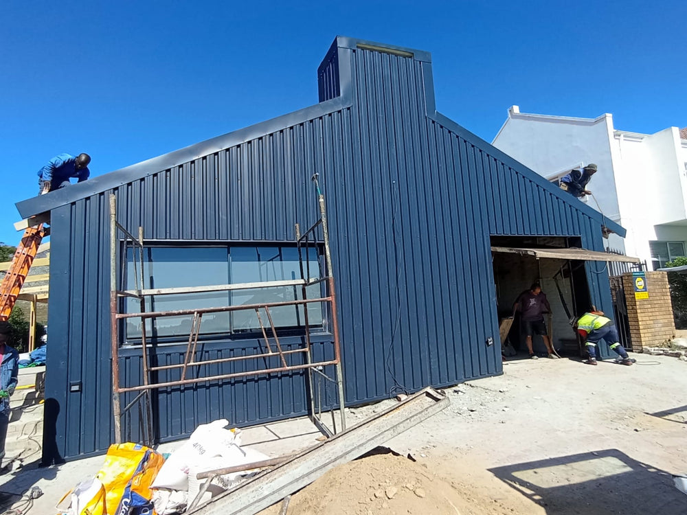 Cladding With Roof Sheets